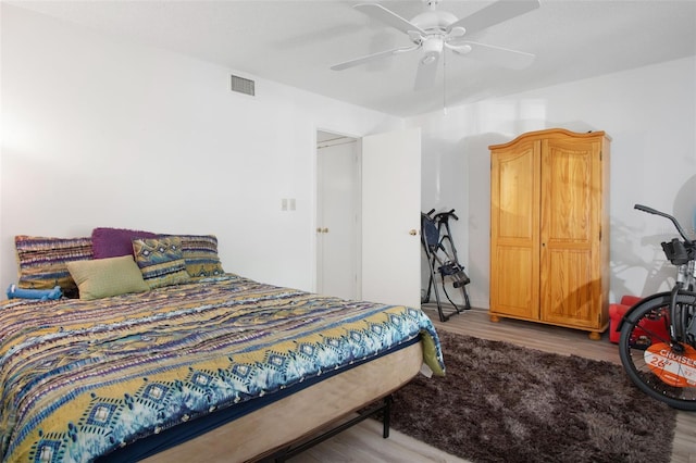 2533 Dolly Bay Dr Unit 203, Palm Harbor, FL 34684 - bedroom with wood finished floors and ceiling fan