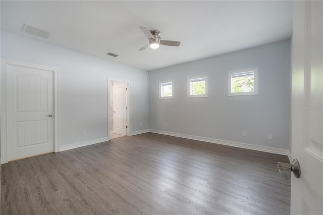3906 N Lynn Ave, Tampa, FL 33603 - spare room with ceiling fan, wood finished floors, and baseboards
