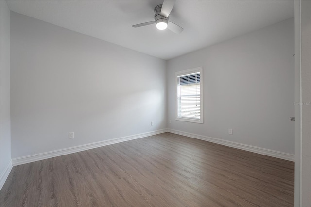 3906 N Lynn Ave, Tampa, FL 33603 - unfurnished room featuring wood finished floors, a ceiling fan, and baseboards