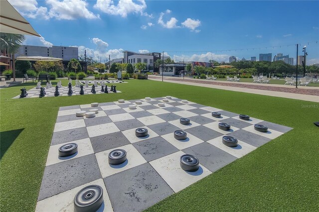 3906 N Lynn Ave, Tampa, FL 33603 - view of home's community featuring a game area and a city view