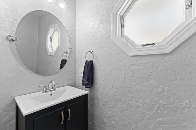 5032 Cypress Trace Dr, Tampa, FL 33624 - bathroom with vanity and a textured wall