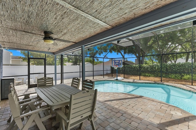5032 Cypress Trace Dr, Tampa, FL 33624 - view of pool featuring a patio area, a fenced backyard, glass enclosure, and ceiling fan