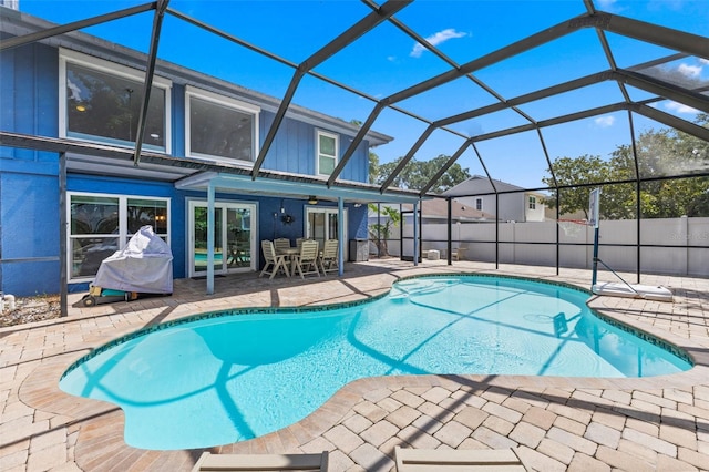5032 Cypress Trace Dr, Tampa, FL 33624 - view of swimming pool featuring a patio area, a lanai, and outdoor dining area