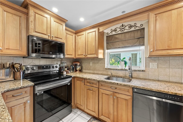 8083 Bayhaven Dr, Seminole, FL 33776 - kitchen featuring dishwashing machine, stainless steel electric stove, a sink, light tile patterned floors, and backsplash