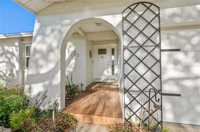 8083 Bayhaven Dr, Seminole, FL 33776 - property entrance featuring stucco siding