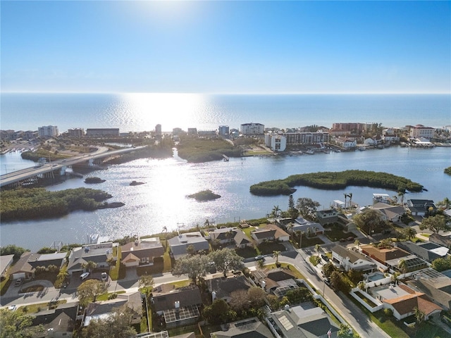 8083 Bayhaven Dr, Seminole, FL 33776 - aerial view of property and surrounding area featuring a nearby body of water, a notable bridge, nearby suburban area, and nearby urban area