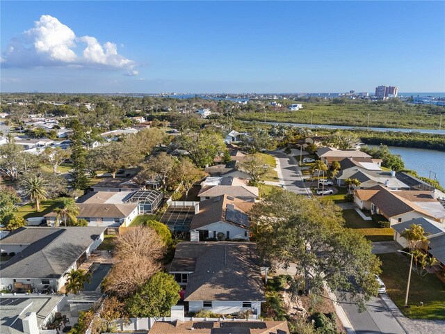 8083 Bayhaven Dr, Seminole, FL 33776 - aerial perspective of suburban area featuring a nearby body of water