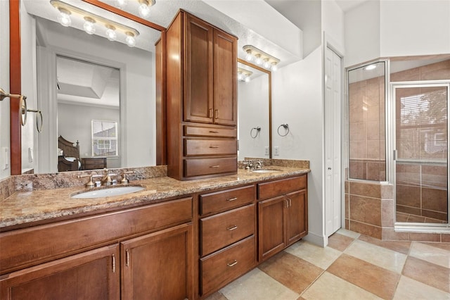 4515 W Leona St, Tampa, FL 33629 - bathroom featuring double vanity, a stall shower, and tile patterned flooring