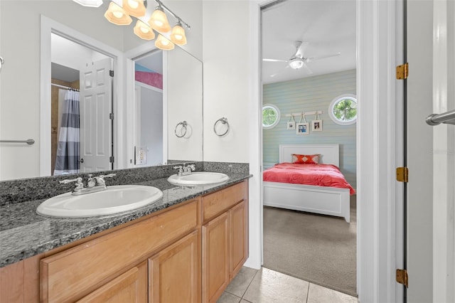 4515 W Leona St, Tampa, FL 33629 - ensuite bathroom with double vanity, tile patterned flooring, and a ceiling fan