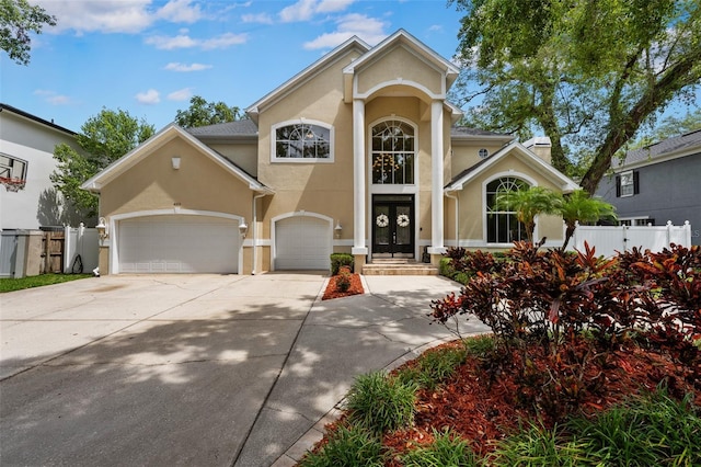 4515 W Leona St, Tampa, FL 33629 - view of front of property with stucco siding, concrete driveway, and a garage