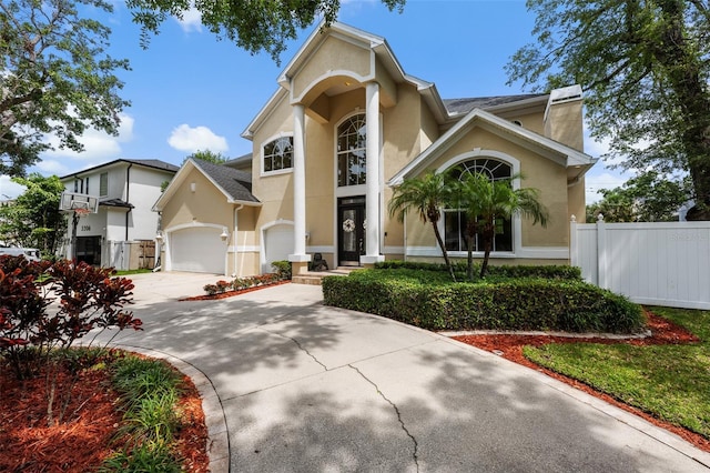 4515 W Leona St, Tampa, FL 33629 - view of front of house with stucco siding, driveway, and an attached garage