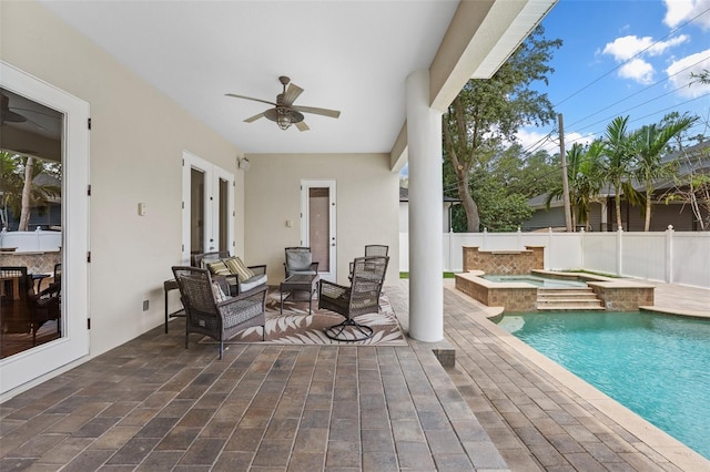 4515 W Leona St, Tampa, FL 33629 - view of swimming pool featuring ceiling fan, a pool with connected hot tub, and outdoor lounge area