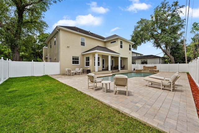 4515 W Leona St, Tampa, FL 33629 - back of house with stucco siding, a fenced backyard, a patio area, and an outdoor living space