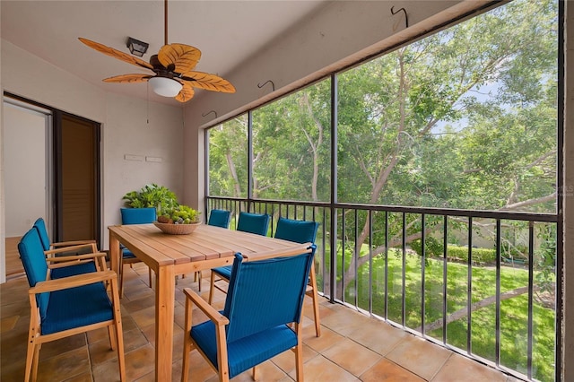 3044 Red Oak Ct Unit 204, Palm Harbor, FL 34684 - sunroom with a ceiling fan and outdoor dining area