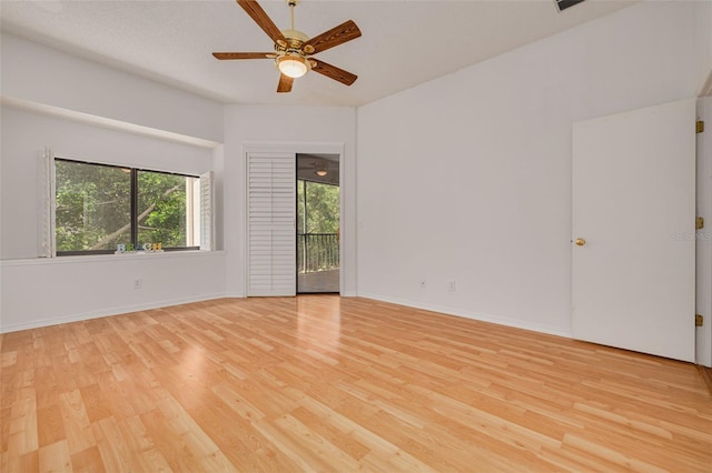 3044 Red Oak Ct Unit 204, Palm Harbor, FL 34684 - unfurnished room featuring light wood finished floors and a ceiling fan