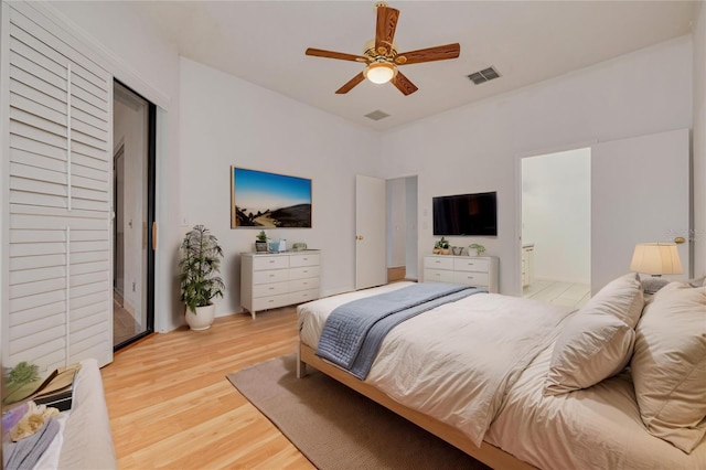 3044 Red Oak Ct Unit 204, Palm Harbor, FL 34684 - bedroom featuring light wood-type flooring and a ceiling fan