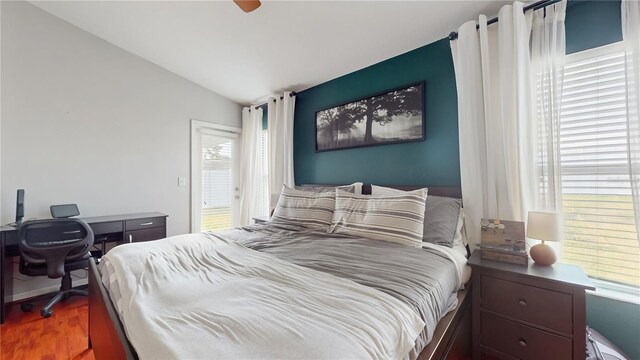 10739 Shady Preserve Dr, Riverview, FL 33579 - bedroom with vaulted ceiling, wood finished floors, a desk, and ceiling fan