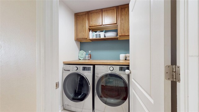 10739 Shady Preserve Dr, Riverview, FL 33579 - washroom featuring separate washer and dryer and cabinet space