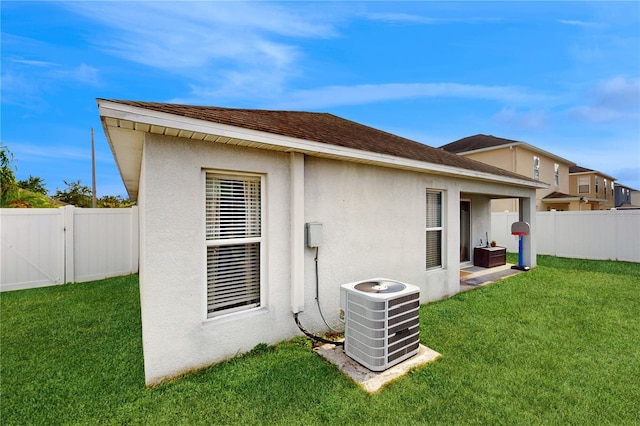 10739 Shady Preserve Dr, Riverview, FL 33579 - back of property featuring central air condition unit and stucco siding