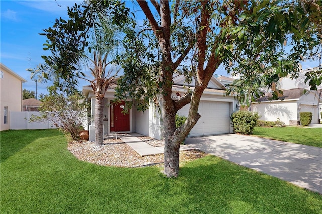 10739 Shady Preserve Dr, Riverview, FL 33579 - obstructed view of property with driveway, an attached garage, and stucco siding