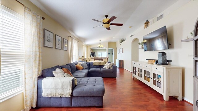 10739 Shady Preserve Dr, Riverview, FL 33579 - living area with a ceiling fan, arched walkways, dark wood finished floors, and baseboards