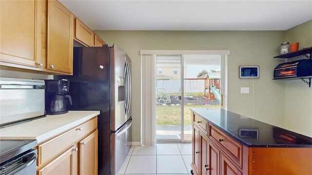 10739 Shady Preserve Dr, Riverview, FL 33579 - kitchen featuring light tile patterned flooring and stainless steel refrigerator with ice dispenser
