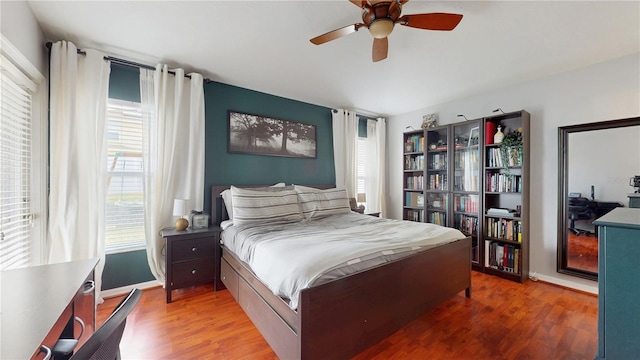 10739 Shady Preserve Dr, Riverview, FL 33579 - bedroom featuring wood finished floors and ceiling fan