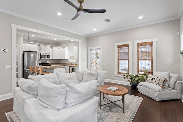 3620 W San Pedro St, Tampa, FL 33629 - living room featuring a ceiling fan, baseboards, recessed lighting, dark wood-style flooring, and ornamental molding