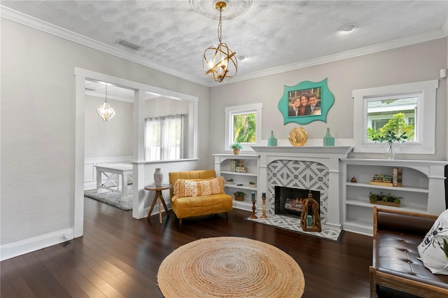 3620 W San Pedro St, Tampa, FL 33629 - living area featuring hardwood / wood-style floors, a chandelier, a fireplace, ornamental molding, and baseboards