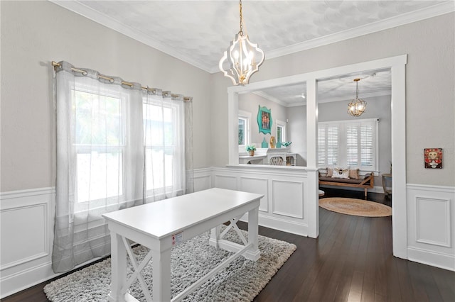 3620 W San Pedro St, Tampa, FL 33629 - dining area with a chandelier, a wainscoted wall, dark wood-style flooring, ornamental molding, and a decorative wall
