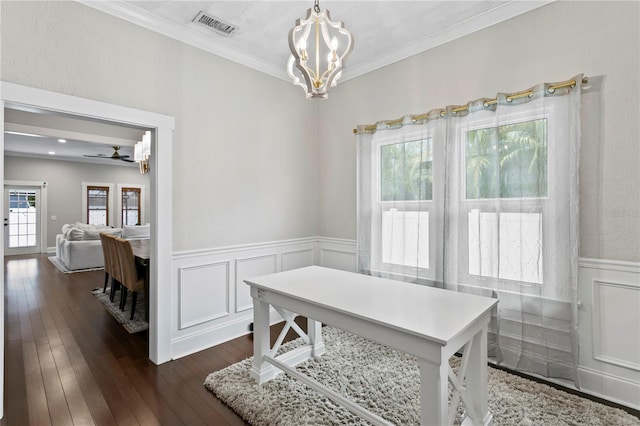 3620 W San Pedro St, Tampa, FL 33629 - dining area with a chandelier, plenty of natural light, wainscoting, dark wood-type flooring, and ornamental molding