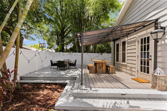 3620 W San Pedro St, Tampa, FL 33629 - wooden terrace featuring outdoor dining space and a fenced backyard