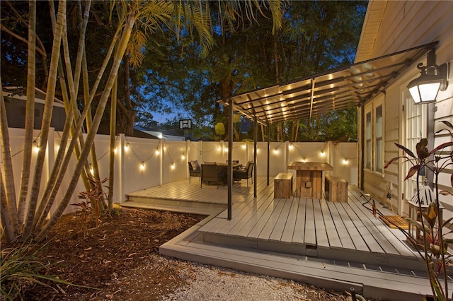 3620 W San Pedro St, Tampa, FL 33629 - deck at night featuring a fenced backyard