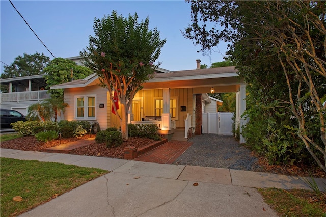 3620 W San Pedro St, Tampa, FL 33629 - view of front of property featuring covered porch, a gate, and board and batten siding