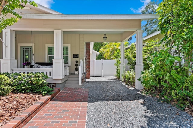 3620 W San Pedro St, Tampa, FL 33629 - view of exterior entry with a porch and a gate