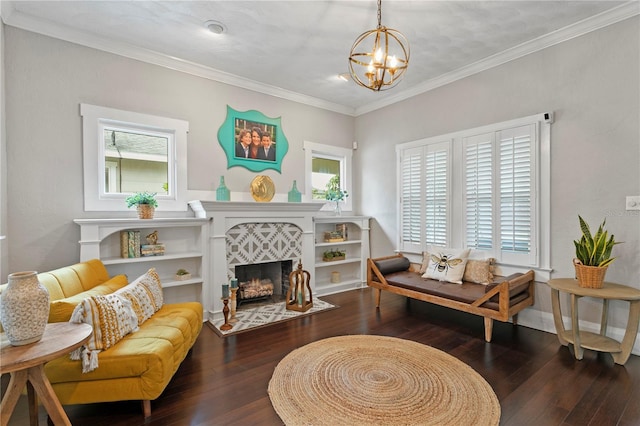3620 W San Pedro St, Tampa, FL 33629 - living room with a chandelier, hardwood / wood-style flooring, a tile fireplace, crown molding, and baseboards