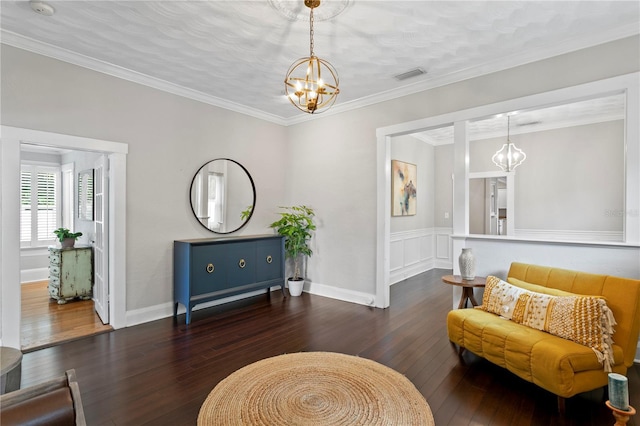 3620 W San Pedro St, Tampa, FL 33629 - living room with a chandelier, wood-type flooring, and crown molding