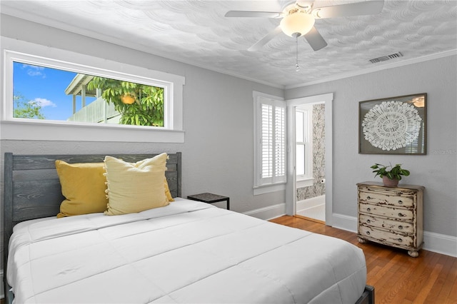 3620 W San Pedro St, Tampa, FL 33629 - bedroom featuring wood finished floors, baseboards, a ceiling fan, ensuite bath, and crown molding