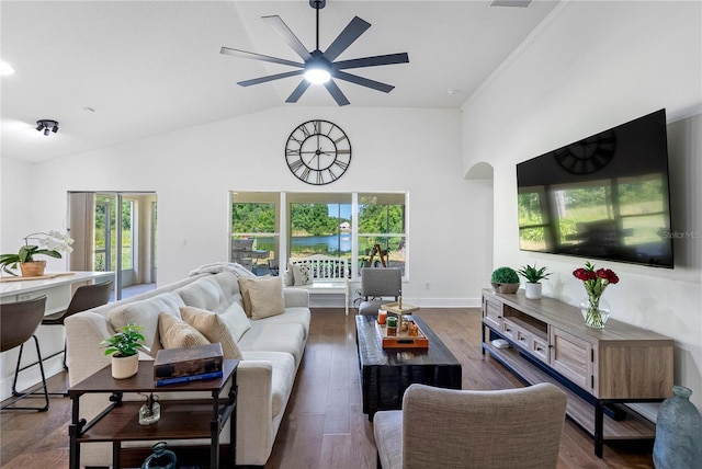 living area with a ceiling fan, wood finished floors, high vaulted ceiling, and baseboards