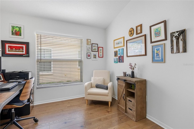 office area featuring wood finished floors and baseboards