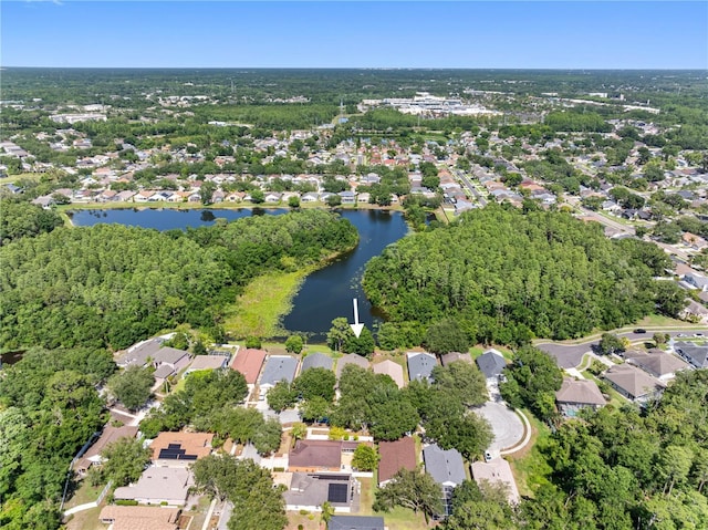 view of property location featuring nearby suburban area and a nearby body of water