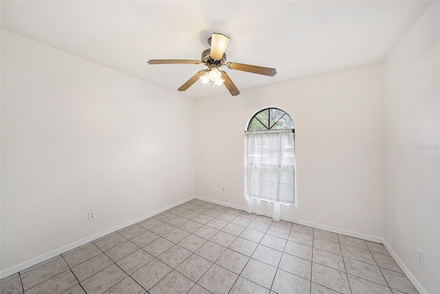 31645 Bugle Ln, Wesley Chapel, FL 33543 - empty room with ceiling fan and light tile patterned floors