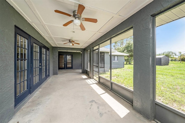 31645 Bugle Ln, Wesley Chapel, FL 33543 - unfurnished sunroom featuring french doors and ceiling fan