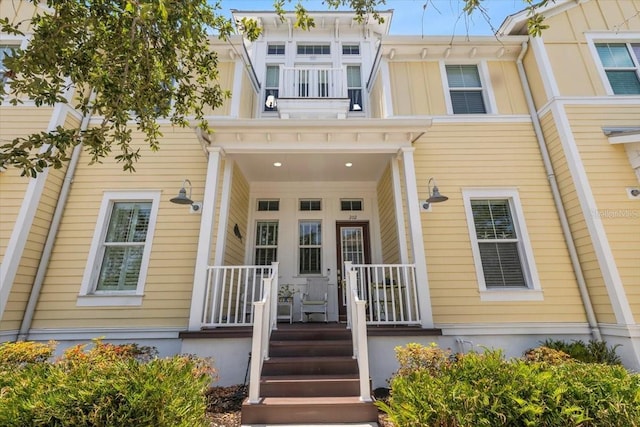 340 Sapphire Lake Dr Unit 202, Bradenton, FL 34209 - view of front facade with covered porch and board and batten siding