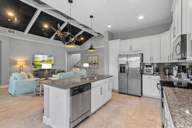 340 Sapphire Lake Dr Unit 202, Bradenton, FL 34209 - kitchen featuring stainless steel appliances, a sink, open floor plan, white cabinetry, and recessed lighting
