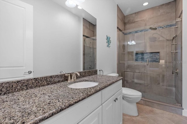 340 Sapphire Lake Dr Unit 202, Bradenton, FL 34209 - bathroom featuring vanity, a shower stall, and toilet