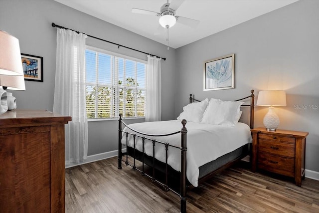340 Sapphire Lake Dr Unit 202, Bradenton, FL 34209 - bedroom with wood finished floors, baseboards, and a ceiling fan