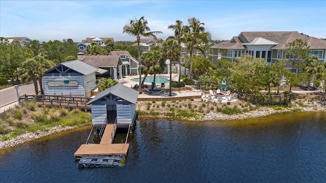 340 Sapphire Lake Dr Unit 202, Bradenton, FL 34209 - dock with a water view and a patio area