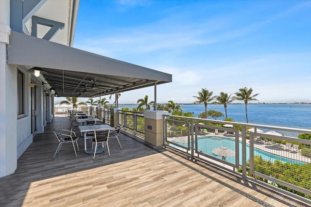 340 Sapphire Lake Dr Unit 202, Bradenton, FL 34209 - wooden terrace featuring a water view and a community pool