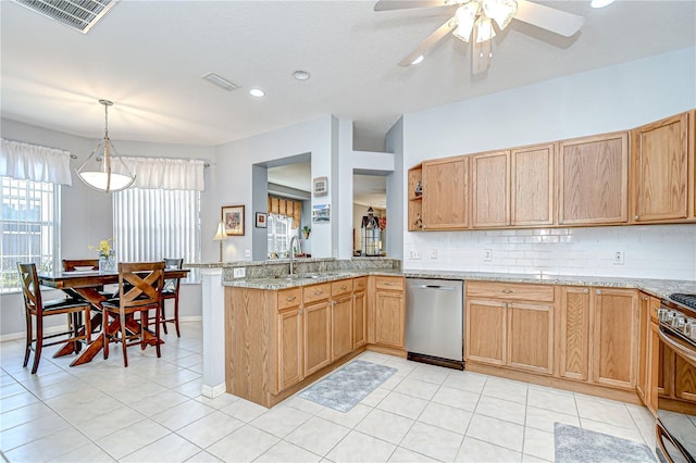 6030 Sandhill Ridge Dr, Lithia, FL 33547 - kitchen featuring stainless steel appliances, a sink, a peninsula, a ceiling fan, and decorative backsplash